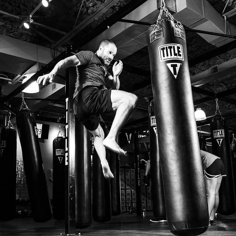 Mixed Martial Arts Lessons for Adults in Chesapeake VA - Flying Knee Black and White MMA